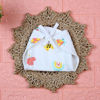 Safari Snuggles Baby Nappy in white with tie up knots, printed with colorful jungle animal prints