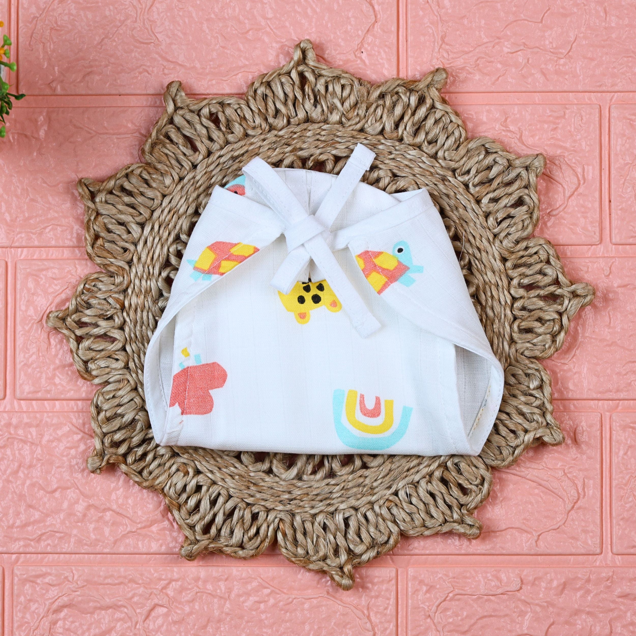 Safari Snuggles Baby Nappy in white with tie up knots, printed with colorful jungle animal prints