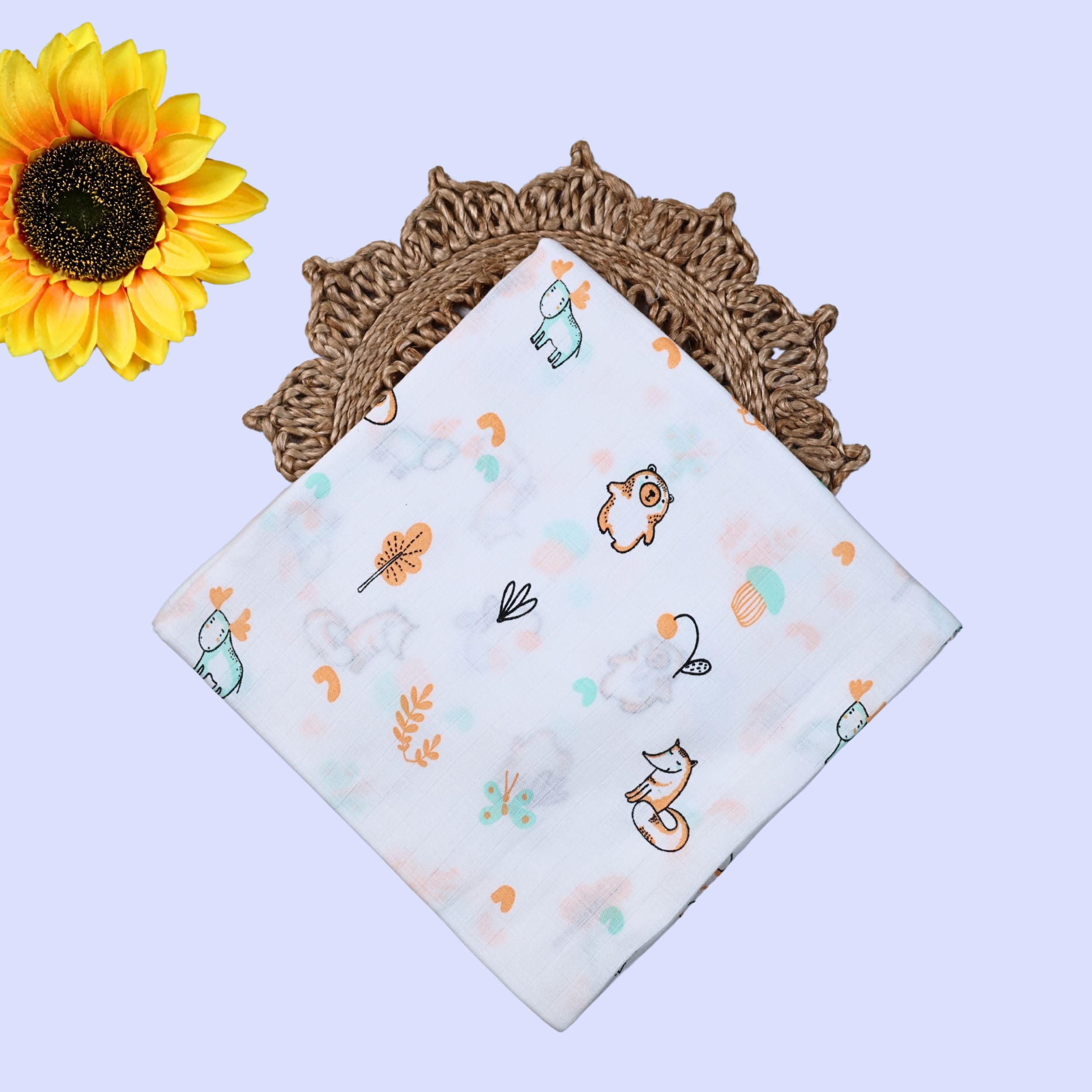 Frosty Forest Baby Swaddle in white printed with animal prints