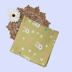 Hoppy Bunny Baby Swaddle in green with bunny design 