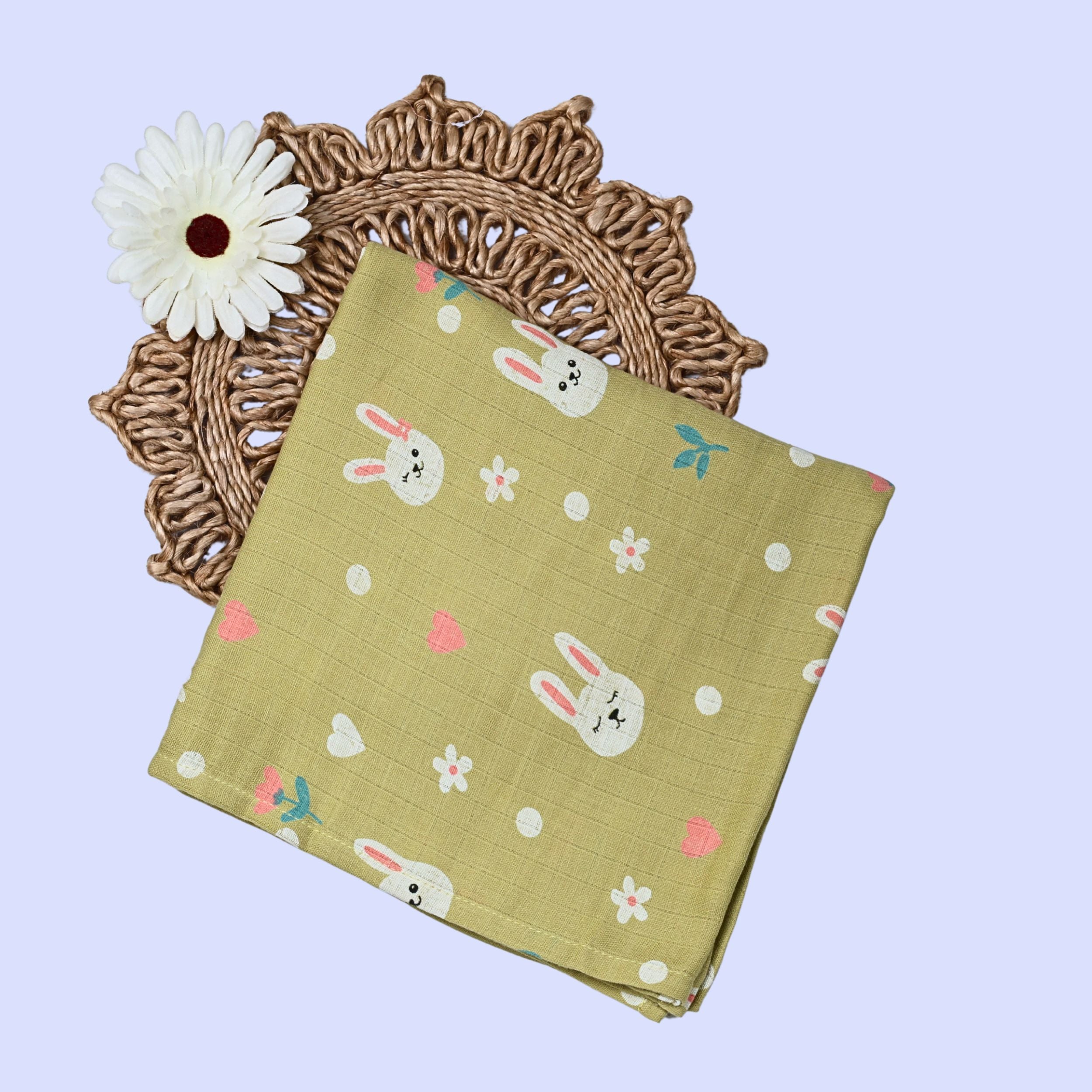 Hoppy Bunny Baby Swaddle in green with bunny design 