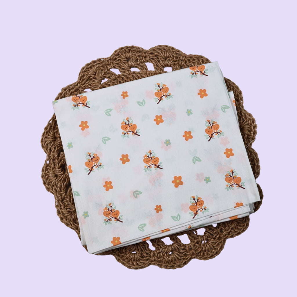 Citrus Bloom Baby Thottil (Jhula) in white with mosquito net printed with orange floral patterns