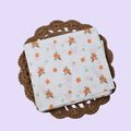 Citrus Bloom Baby Thottil (Jhula) in white with mosquito net printed with orange floral patterns