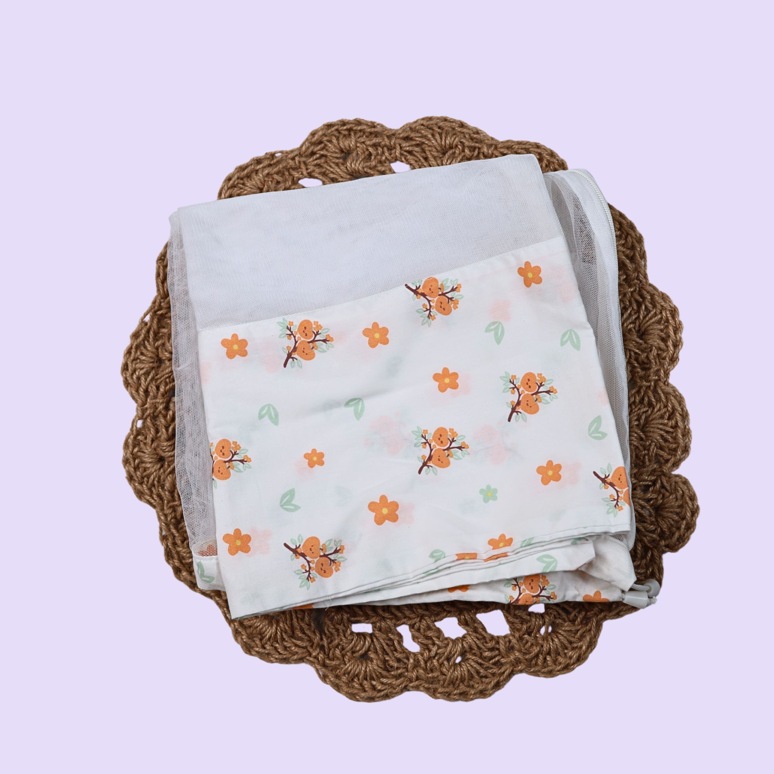 Citrus Bloom Baby Thottil (Jhula) in white with mosquito net printed with orange floral patterns