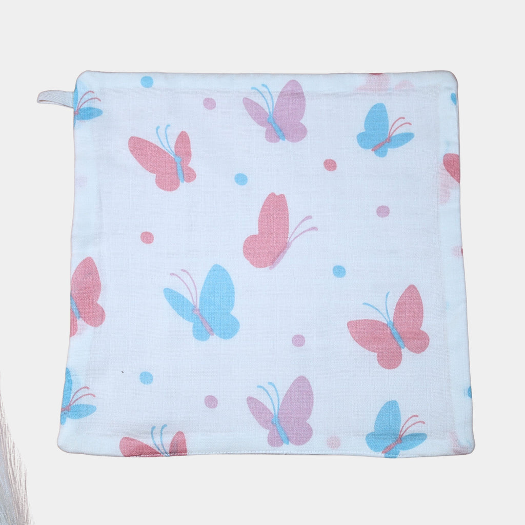 Butterfly Blush baby wipe in white printed with pastel butterfly motifs in soft pink and blue tones.