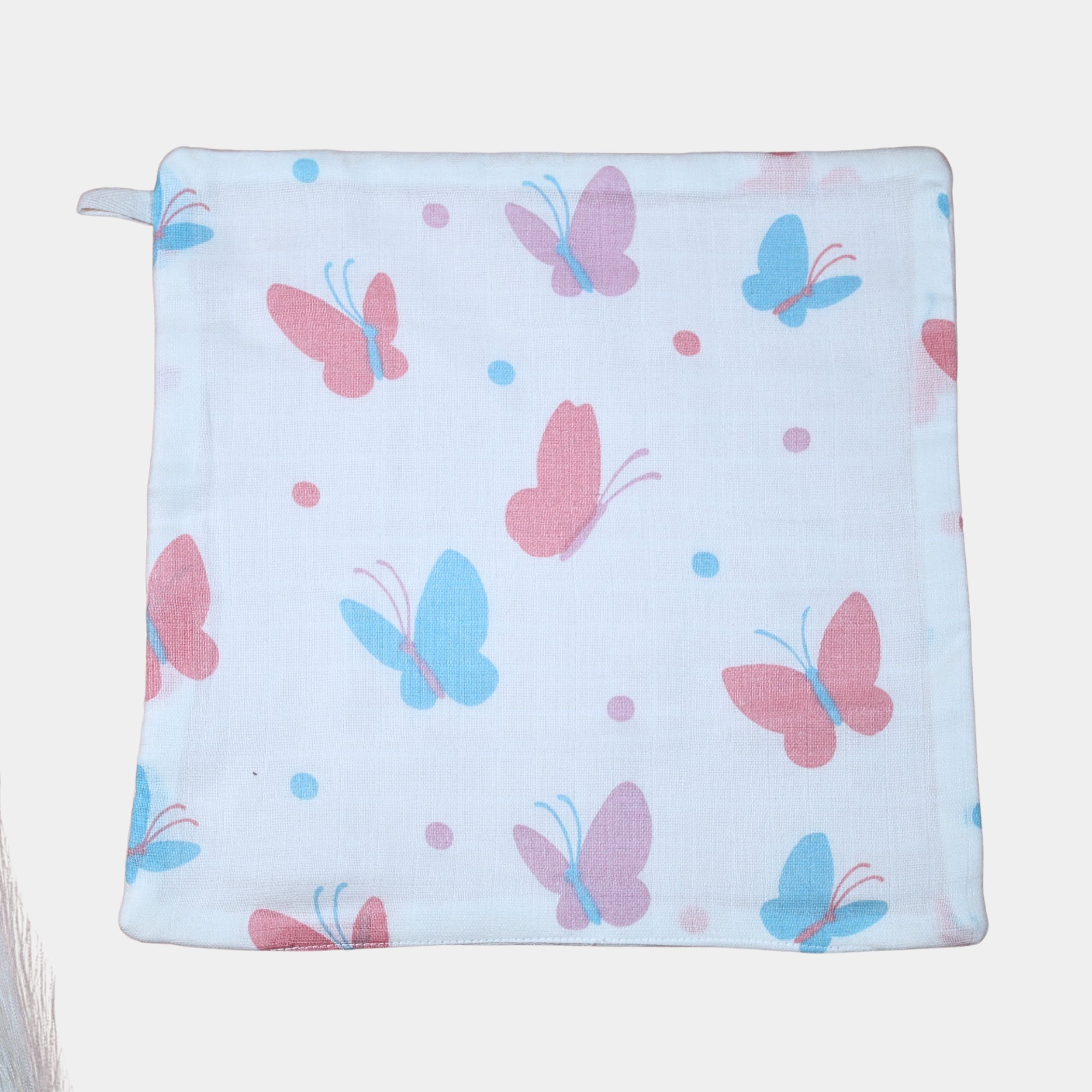 Butterfly Blush baby wipe in white printed with pastel butterfly motifs in soft pink and blue tones.