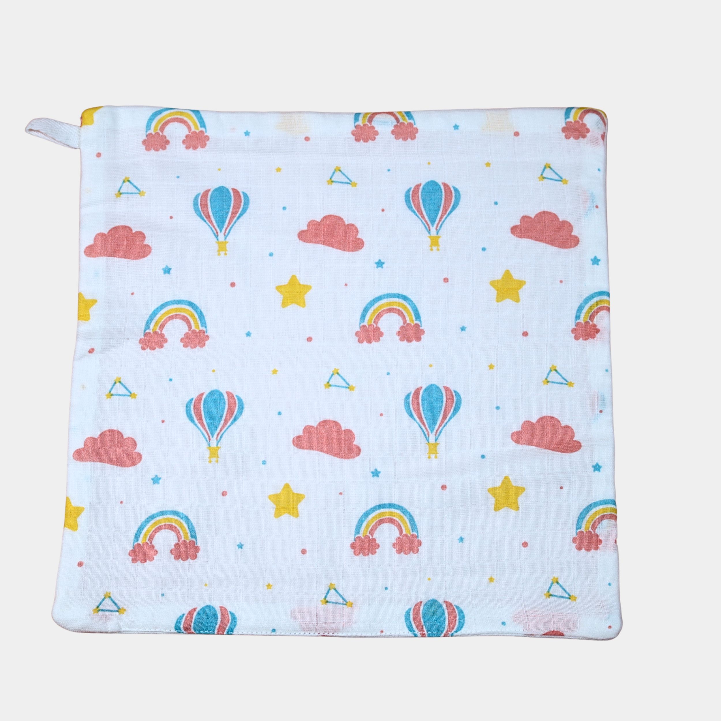 Rainbow Rides Baby Wipes in white printed with rainbow, cloud, and hot air balloon pattern
