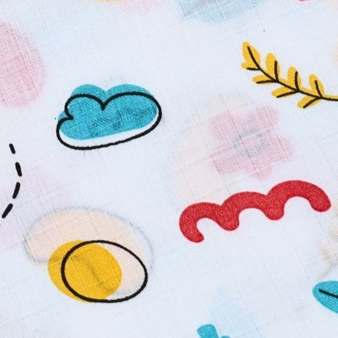 Colorful fabric with cartoon-like designs including an egg, cloud, and abstract shapes on a white background.
